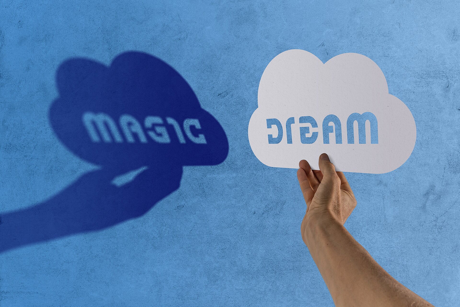 A graphic depicts hands holding clouds with the words 'magic' and 'dream', illustrating creative freedom in Bollywood.
